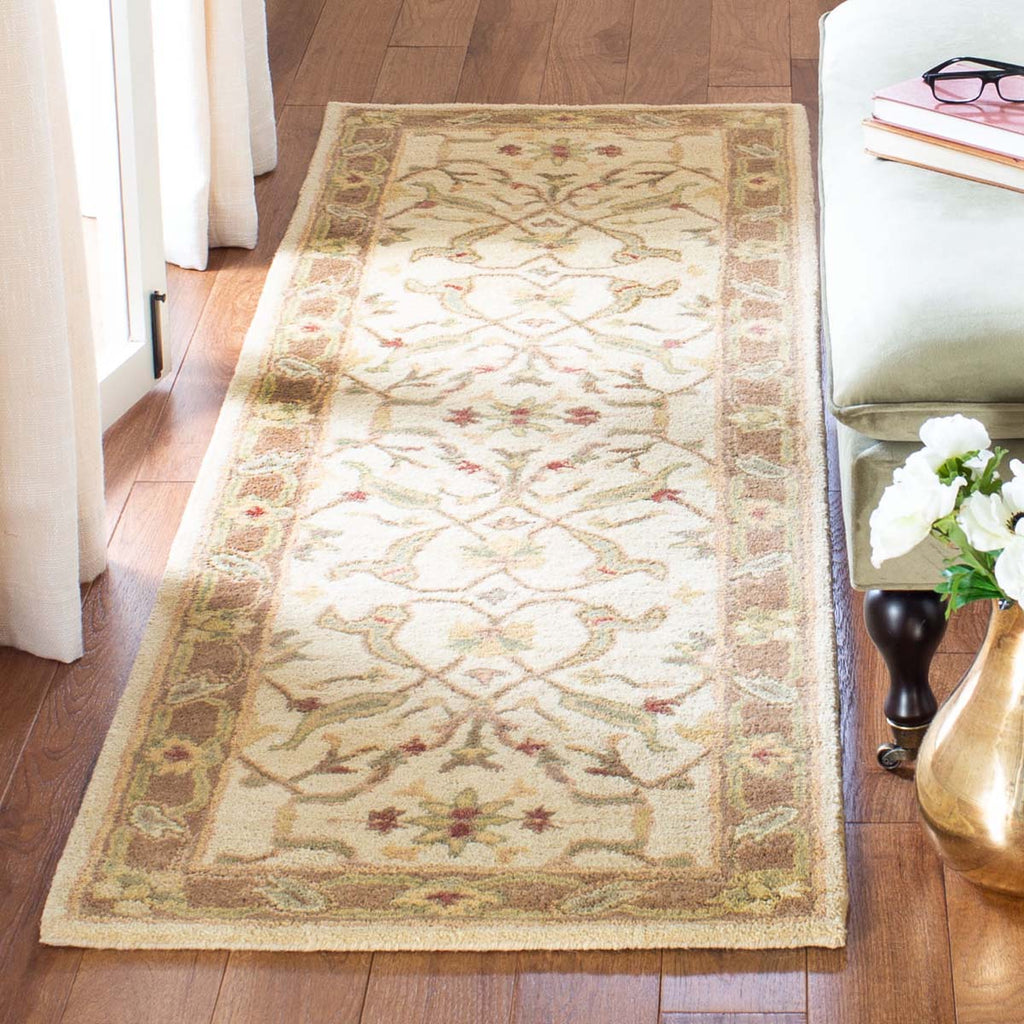 Safavieh Antiquity Rug Collection AT311C - Ivory / Brown