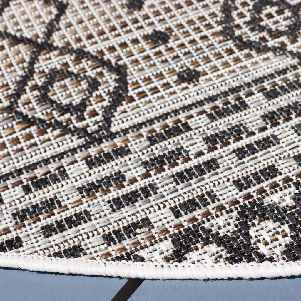 Safavieh Havana Rug Collection: HAV301E - Light Brown / Black