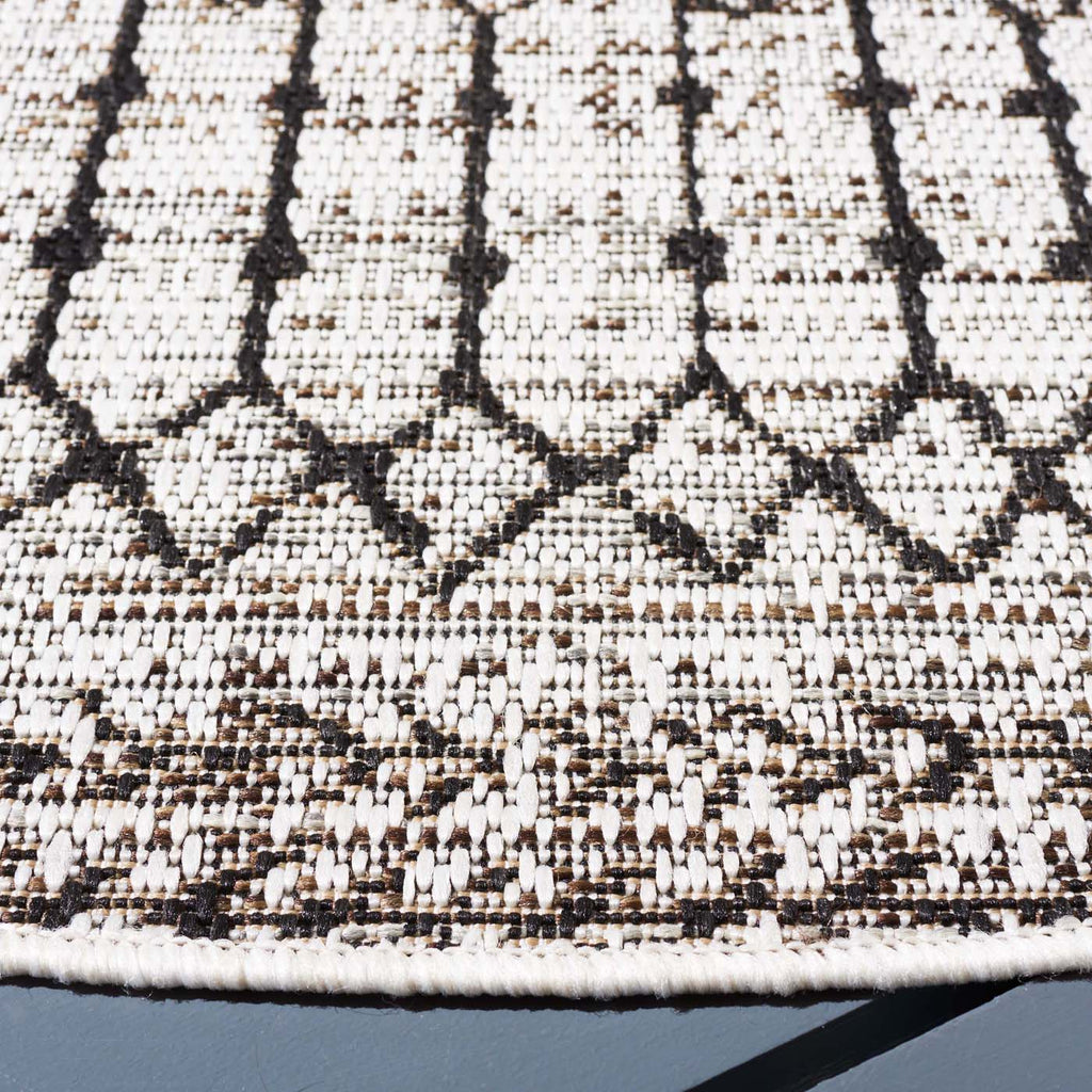 Safavieh Havana Rug Collection: HAV370E - Light Brown / Black