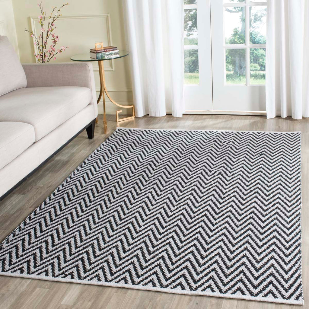 Safavieh Montauk Rug Collection MTK812D - Black / Ivory