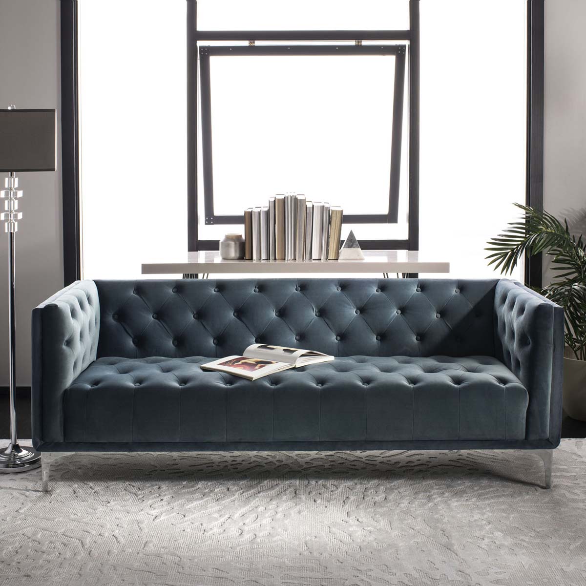 Blue tufted store sofa