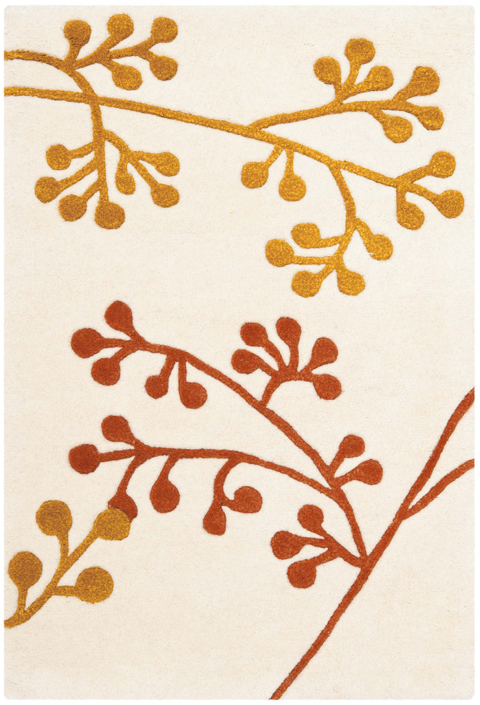 Safavieh Soho Rug Collection: SOH305B - Ivory / Orange