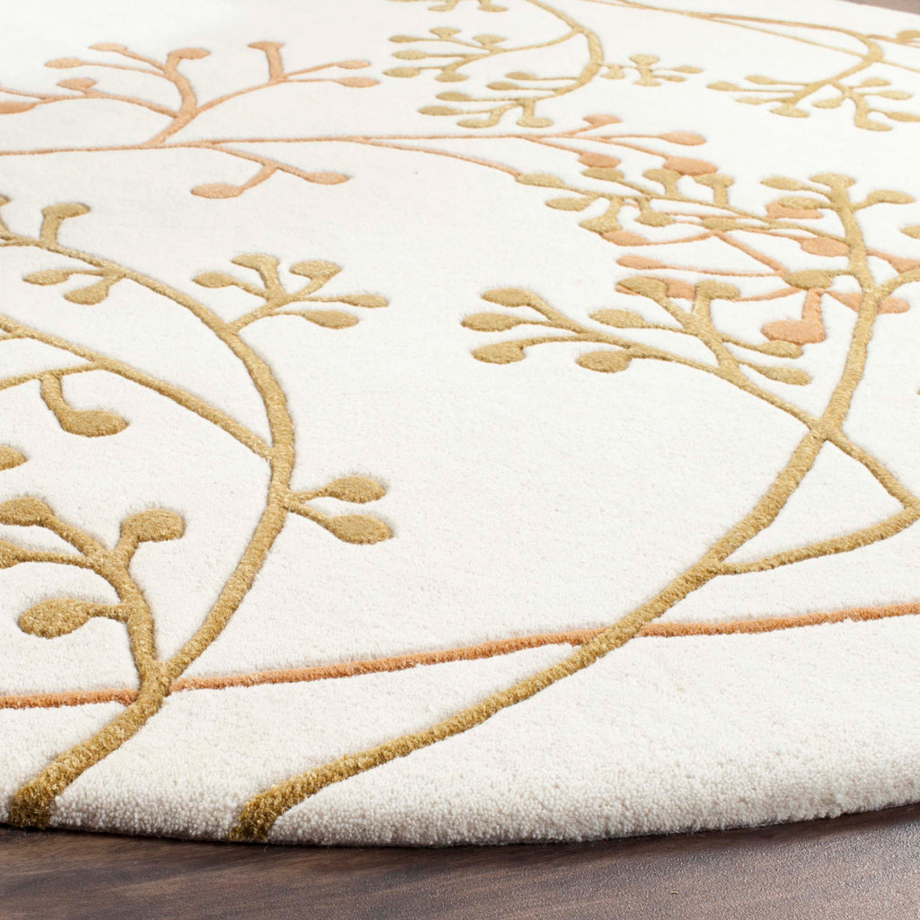 Safavieh Soho Rug Collection: SOH305B - Ivory / Orange